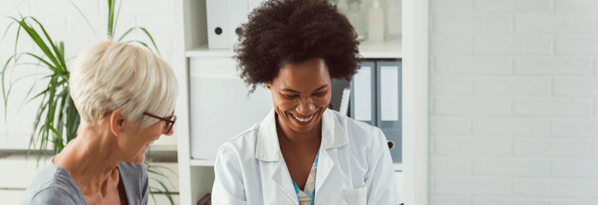 a woman in a white coat