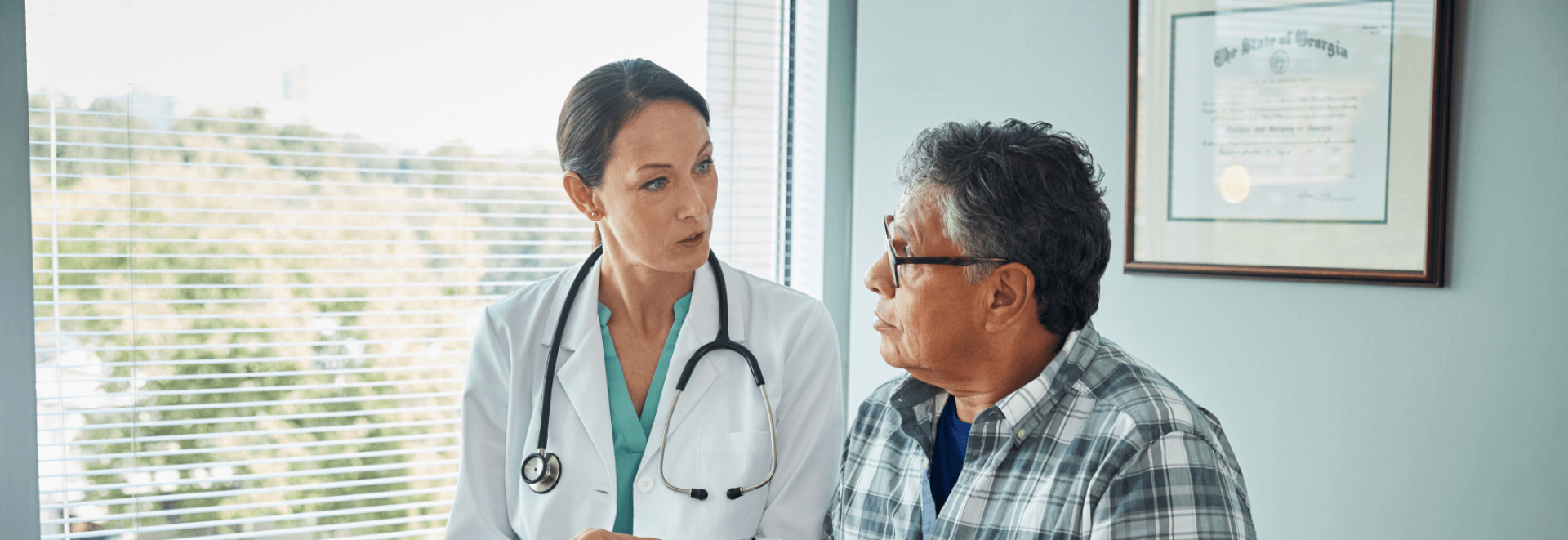 a doctor talking to a patient