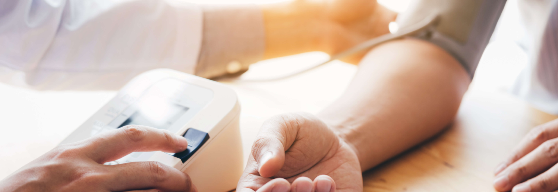 a person measuring blood pressure