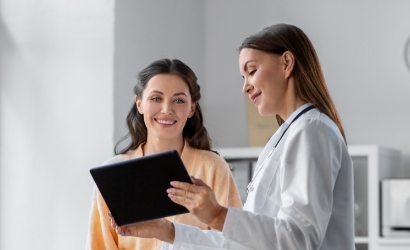 woman talking to doctor